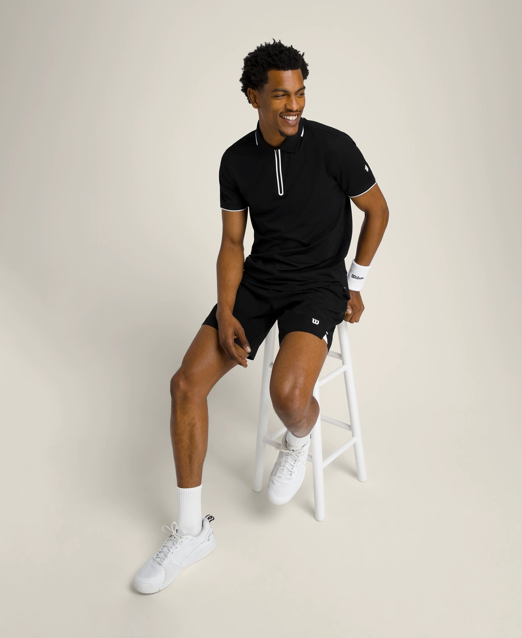 Advantage Zip Polo in Black