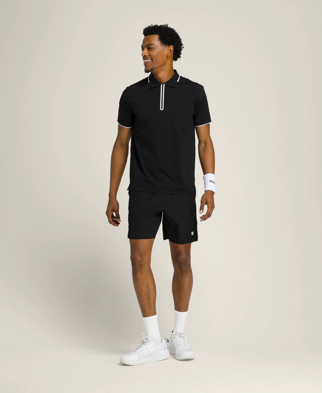 Advantage Zip Polo in Black